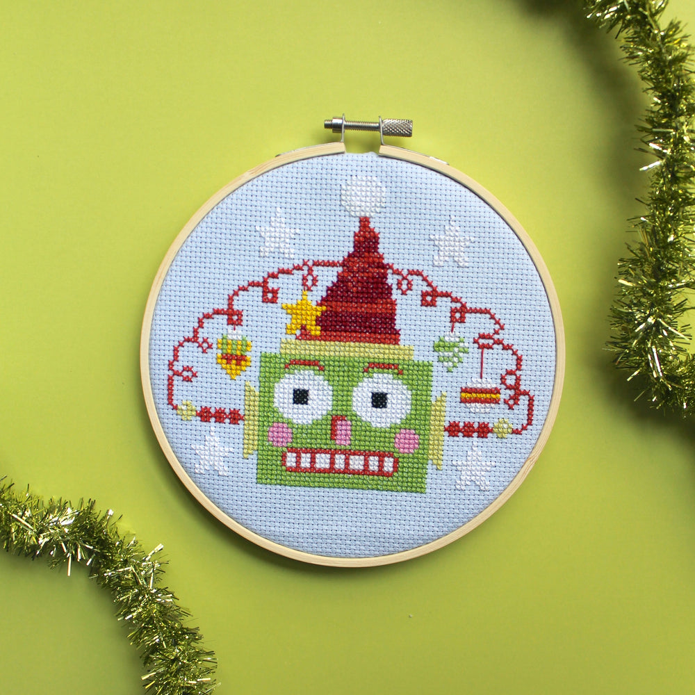 Green Christmasbot by Mary Engelbreit Counted Cross Stitch Digital Pattern