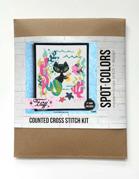Counted cross stitch kit packaging with a cat-themed design on a white background