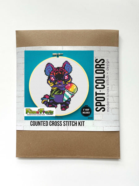 Counted cross stitch kit packaging with cartoon character on a white background