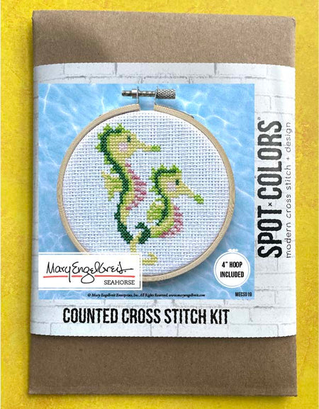 Counted cross stitch kit with seahorse design on a yellow background