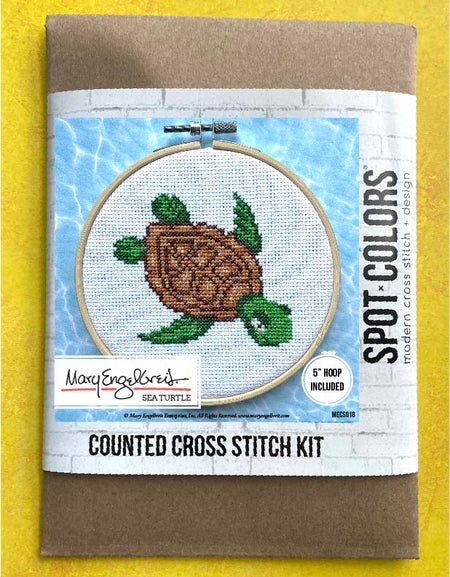 Counted cross stitch kit packaging with turtle design on a yellow background